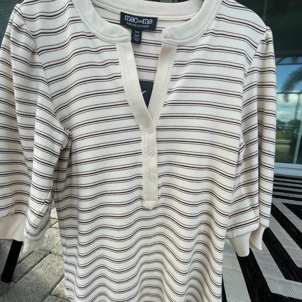 Cute  three quarter length sleeve top size Medium .